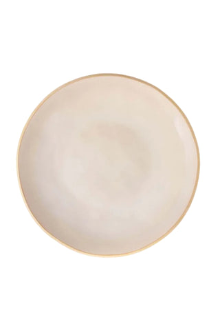 A top-down view of a round ceramic plate in a warm cream color with a thin gold rim, shown on a white background with the Nosse Ceramics logo in the top left corner.